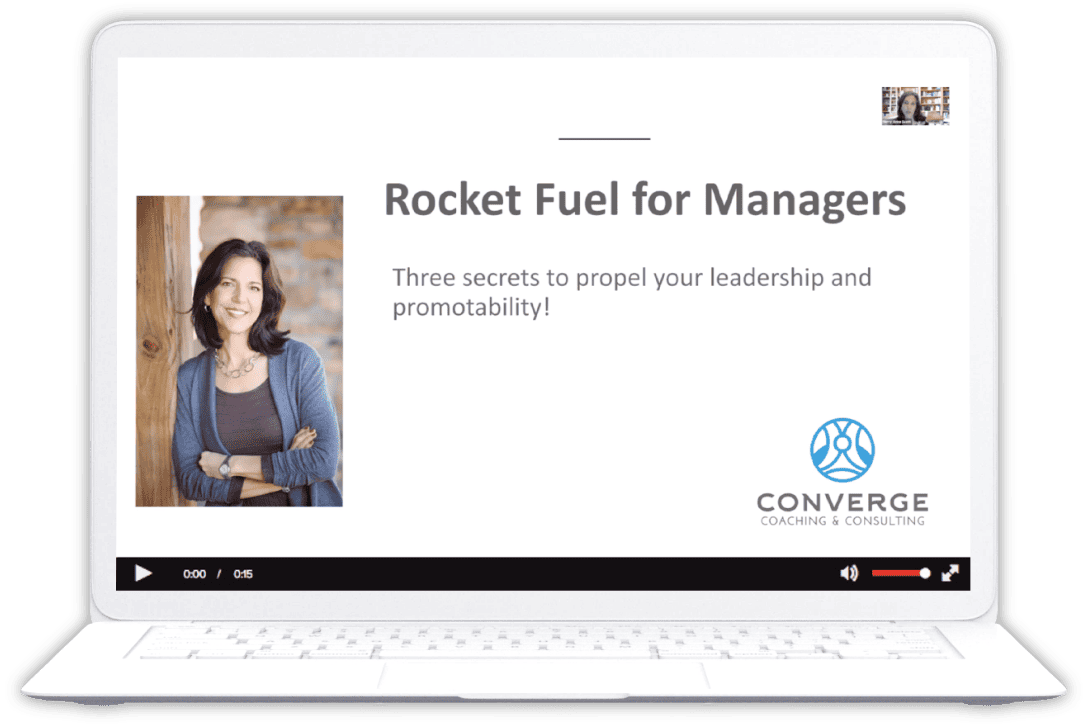 Laptop showing Rocket Fuel for Managers.